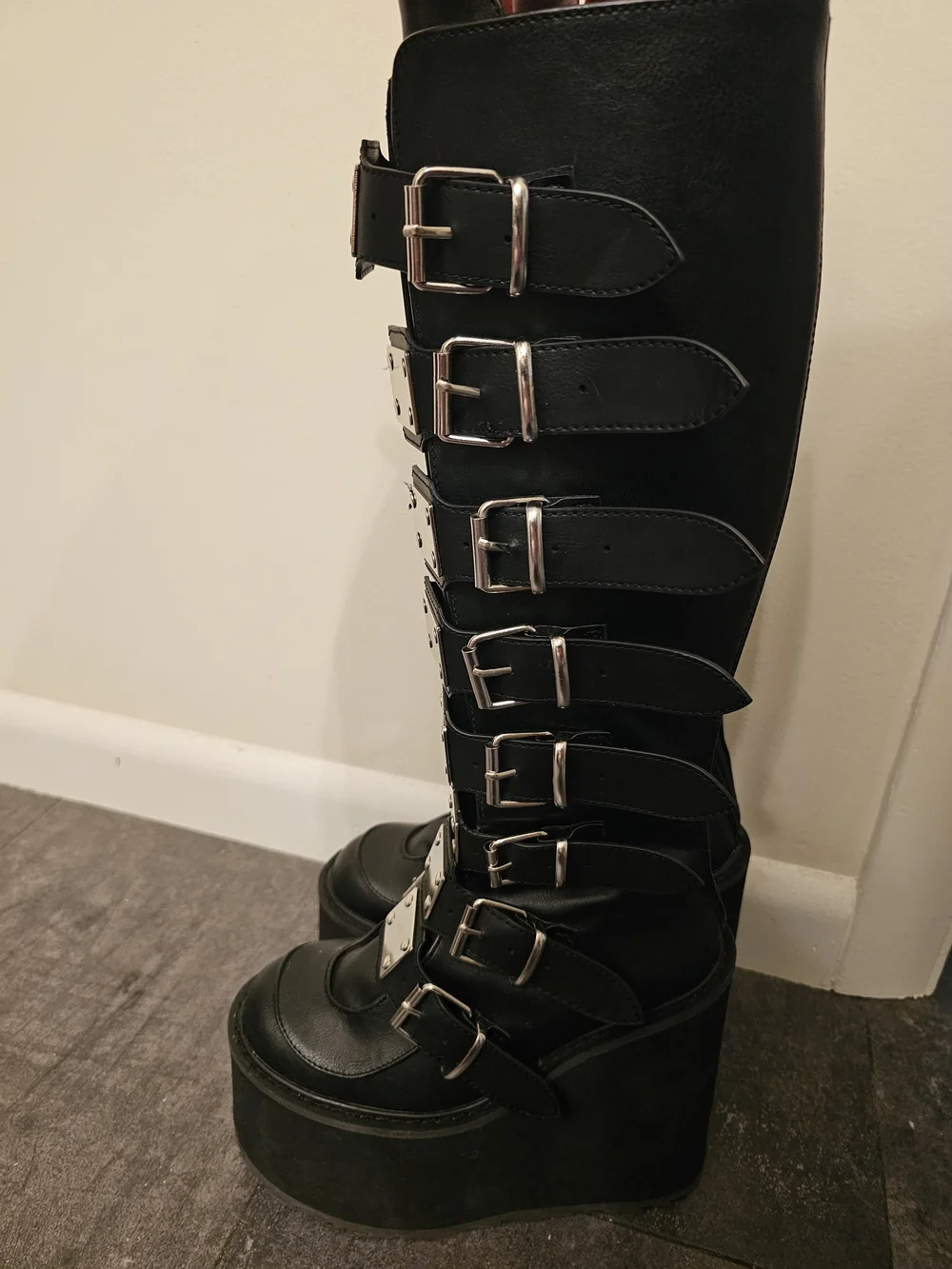 Demonia Black Over-The-Knee Platform Buckle Boots